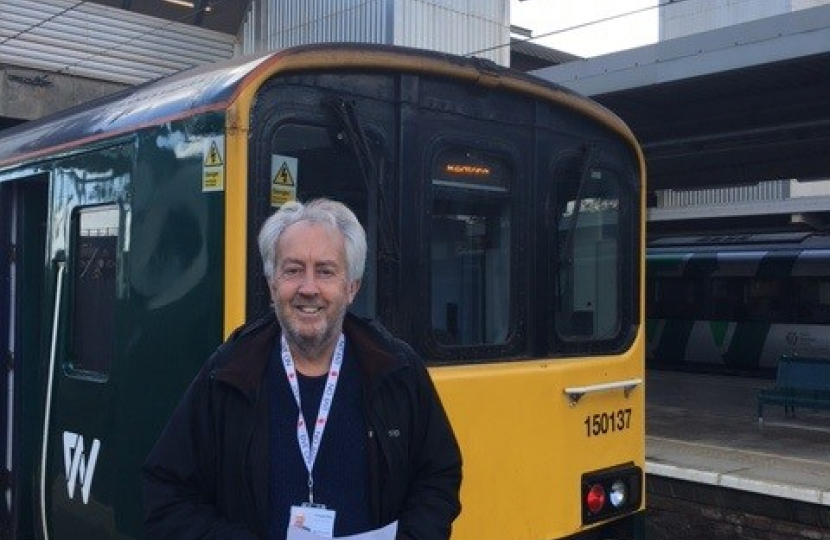 Cllr Hopkins in front of train 